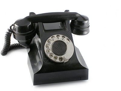白色背景的旧黑电话高清图片