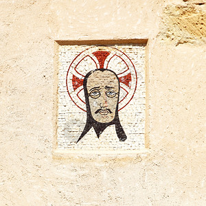 西班牙阿利坎特圣芭拉堡垒中哭泣的古代马赛克标志图片