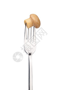 叉子上的蘑菇白色背景上的孤立蘑菇图片