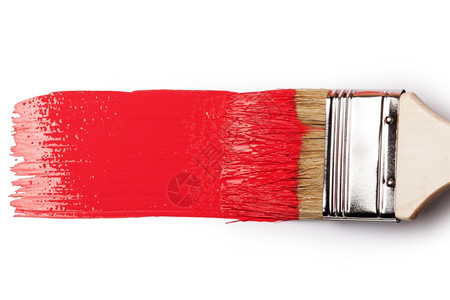 红油漆的笔刷白背景上隔绝的红油漆笔刷图片