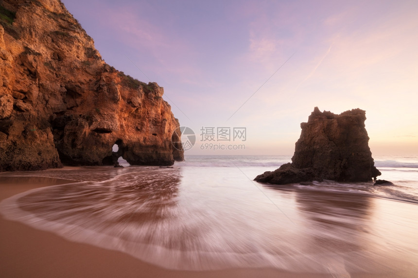 葡萄牙阿尔加韦大西洋岩石状海岸线日落图片