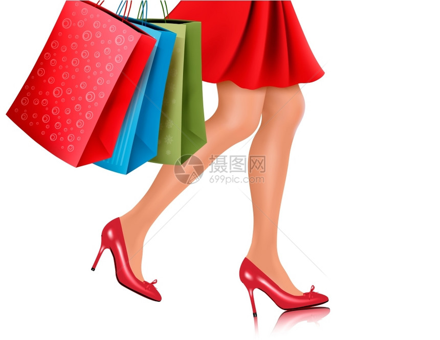 妇女穿着红色高跟鞋并携带购物袋图片