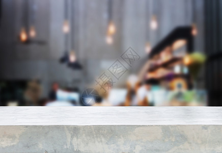 咖啡店背景模糊的混凝土桌板图片