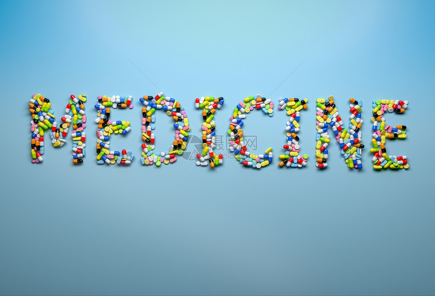 医药和保健概念用蓝底胶囊和药丸拼写成单词的医药图片