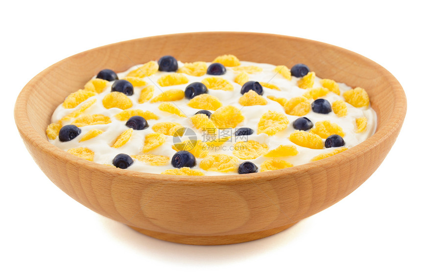 白色背景木碗里的玉米片和蓝莓图片