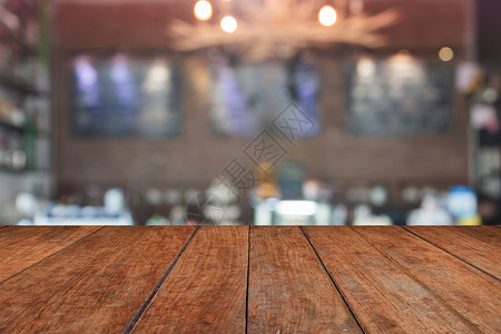棕色桌顶背景咖啡店内面模糊图片
