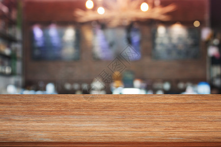 咖啡馆背景模糊的棕色木桌顶产品显示模板图片