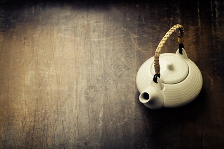 传统东方茶壶的古老背景图象图片