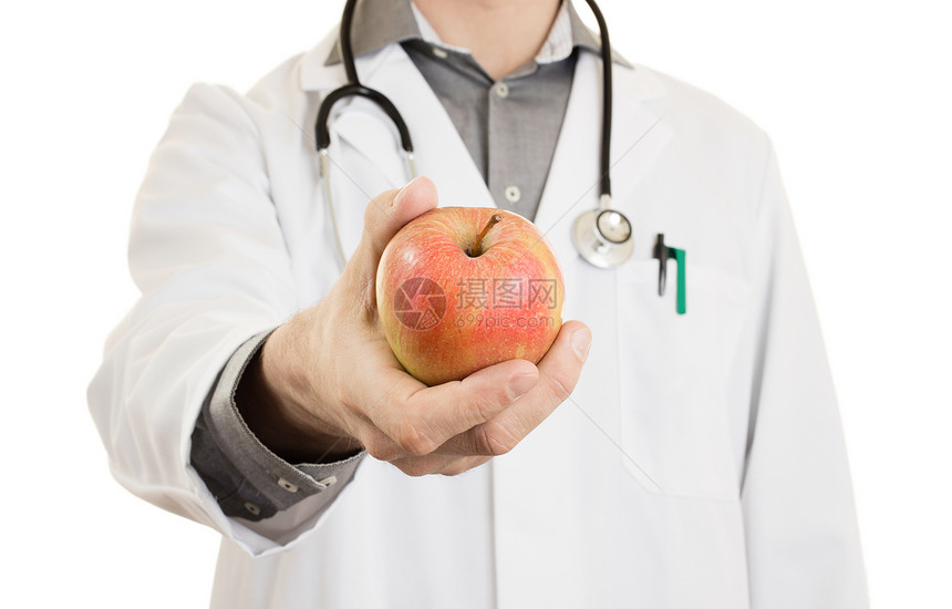 营养学医生给一个苹果孤立在白色上图片