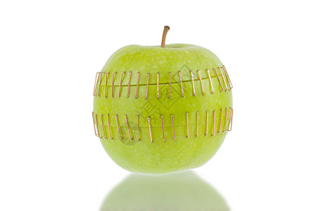 切苹果一半加上黄铜主食高清图片