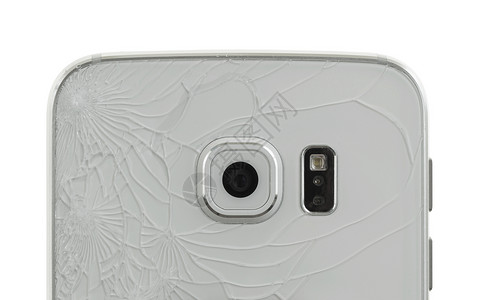 玻璃裂纹智能手机倒在地上碎玻璃背背景