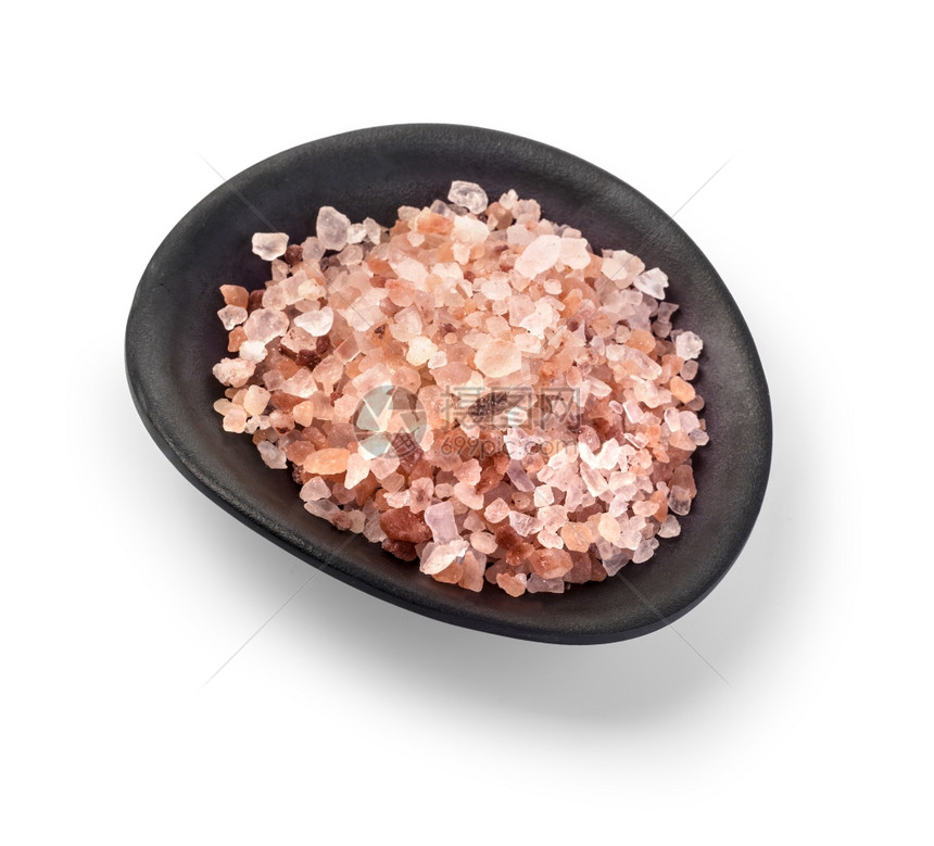 粉红色喜马拉雅盐在一个碗中孤立无间有剪切路径图片