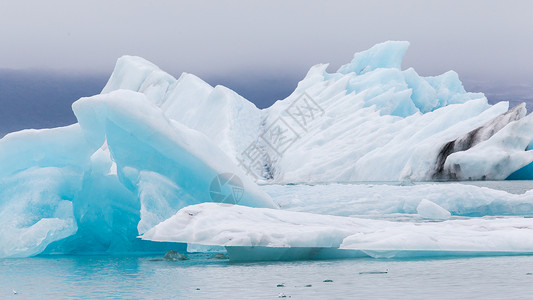 斯卡费尔Jokulsarlon是冰岛东南大湖河破碎了背景