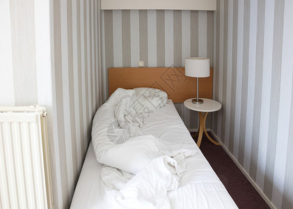 简易小旅馆房间古典单床背景