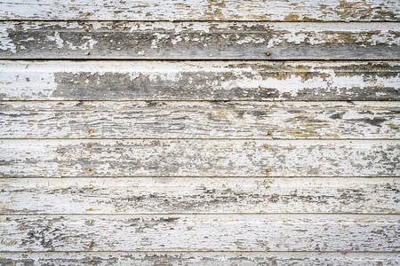 生锈和风化的木材背景废弃房屋墙上的木板图片