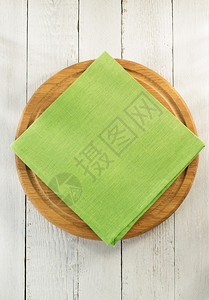 餐巾纸和木制板餐巾纸和板餐桌巾板图片
