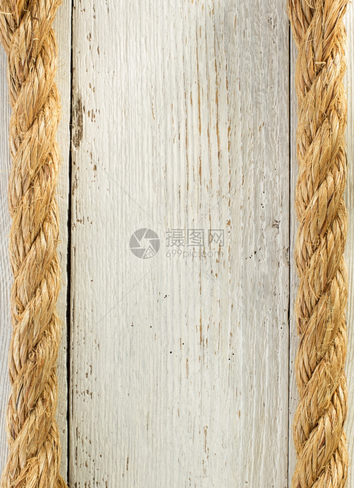 木制背景的船绳图片