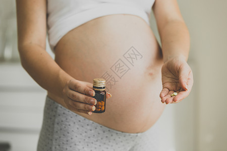 孕妇用药丸中维他命的近照片背景