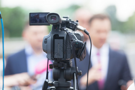 录像或电视摄影机记者招待会电视广播背景图片