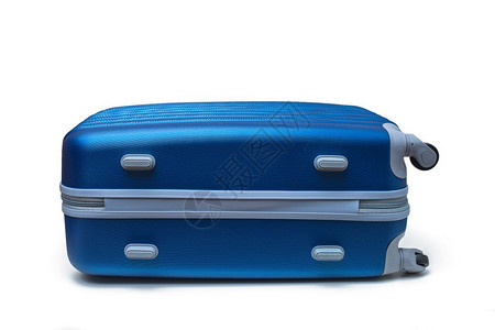 蓝色旅行手提箱用白色和剪切路径隔离在白色上图片