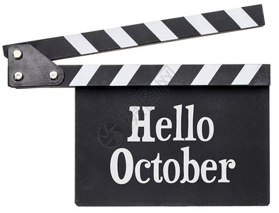 你好10月的电影标题白色粉笔在钟板上的白孤立在色上图片
