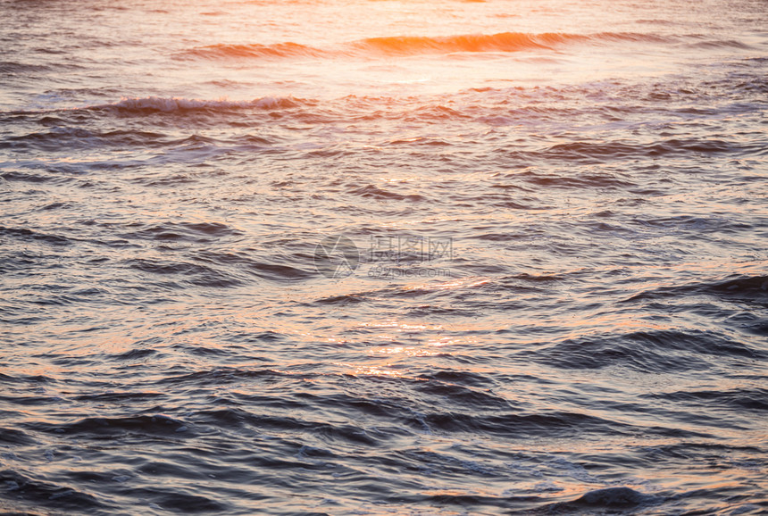 海洋浪表面日出海景抽象自然背图片