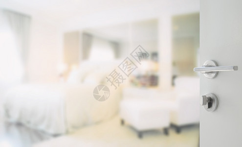白色卧室的模糊图像背景图片