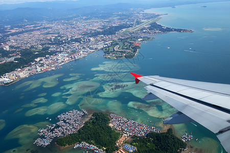 基纳巴卢马来西亚萨巴赫KotaKinabalu和Gaya岛空中观视背景