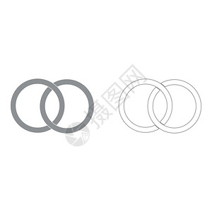 两个紧凑的结婚戒指两个紧的结婚戒指两个紧地紧固定着图片