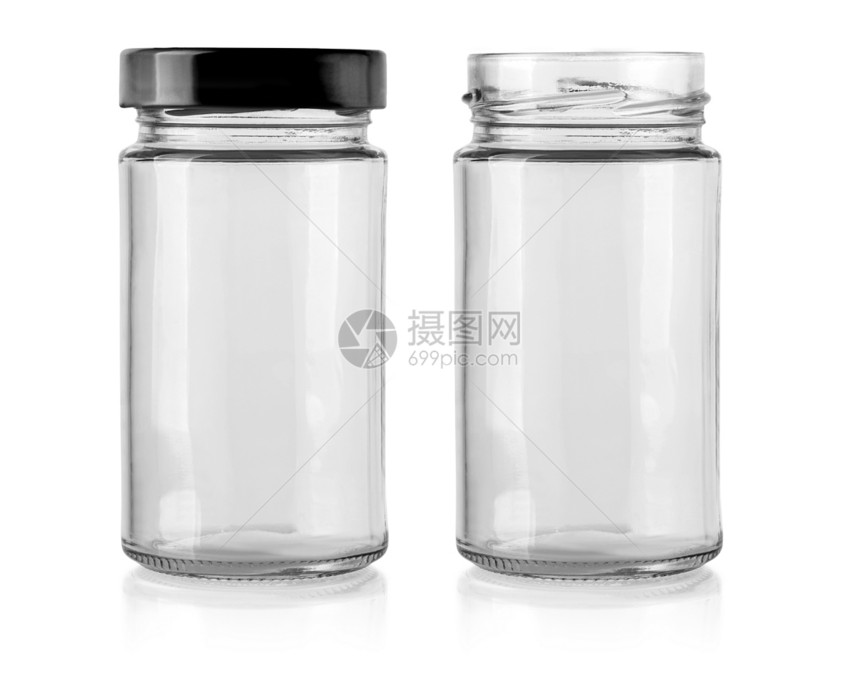 白色背景上隔开的玻璃罐图片