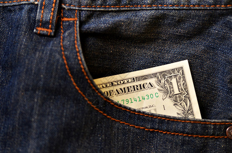 一美元钞票的琴口袋商业概念零用钱图片