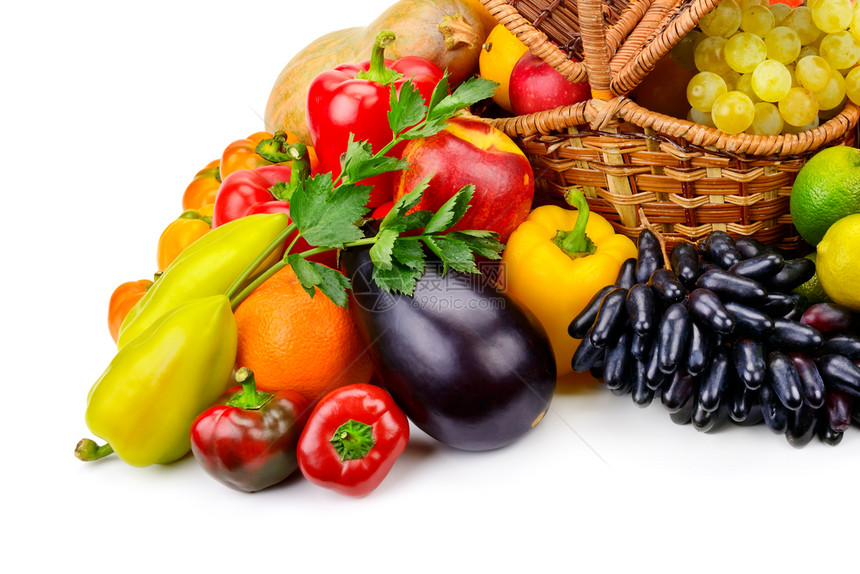 带新鲜水果和蔬菜的篮子被白色隔开图片