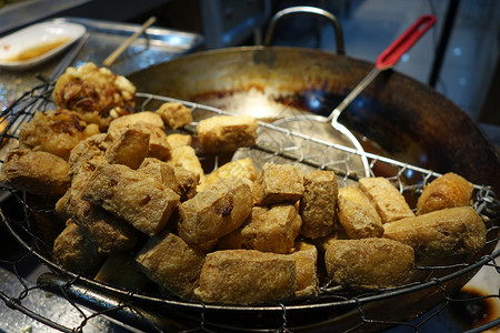 豆腐摊上海街食品摊的臭炸豆腐背景