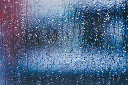 防雨素材窗户上有雨滴背景