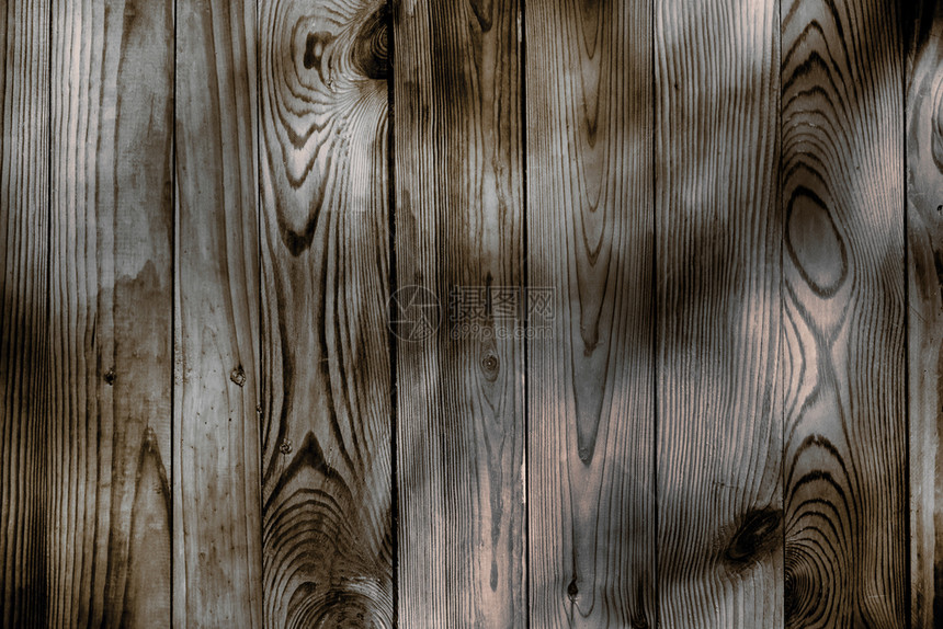 棕色木板背景天然焦土表面图片