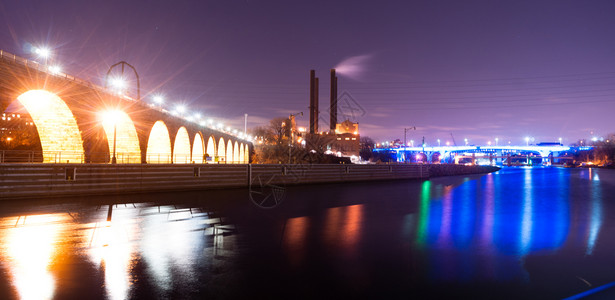 密西比河缓慢流进圣保罗明尼苏达河滨桥下背景图片