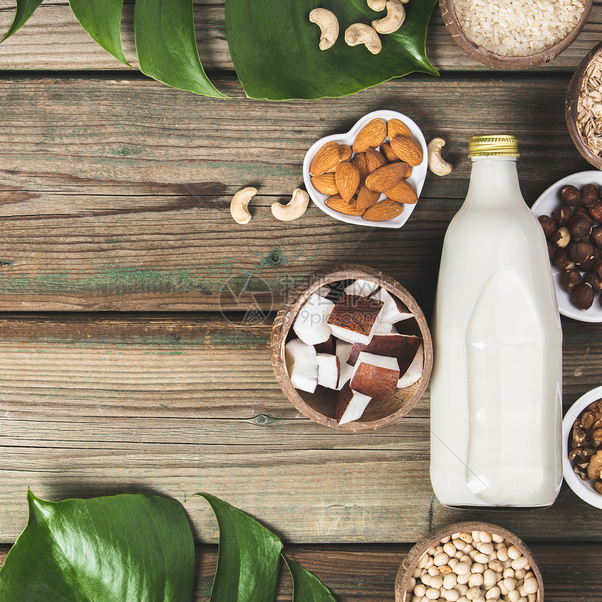 免乳奶替代饮料和食用杂木本底平铺无乳品素食清洁饮概念图片