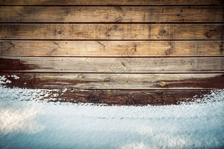 雪中的格龙盖木板冬季时间背景图片