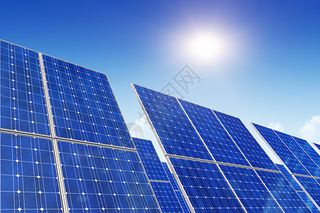 创意太阳能发电技术替代能源和环境保护生态商业概念用太阳能电池板对蓝天和阳光的太能电池板组背景图片