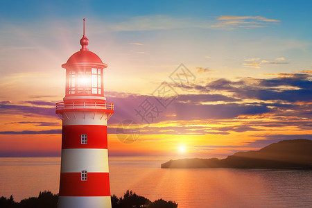 海边或岸灯塔光和美丽的浪漫日落景色夏季图片