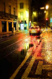 阿尔法汽车旧欧洲城市葡萄牙里斯本街道夜景背景