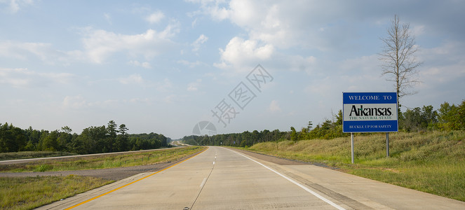 欢迎南方小土豆路牌显示你正进入阿肯色州自然状态背景