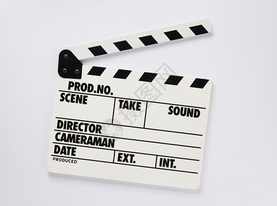 白色背景顶视图上的电影扣锁板背景图片
