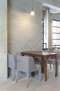 咖啡桌和厅椅灯光带套装的咖啡桌和椅背景图片