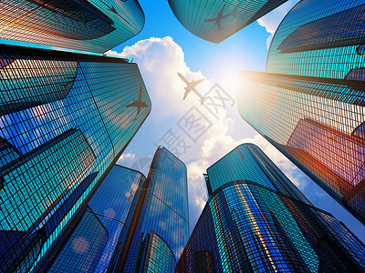 商业公司建筑玻璃反射在高楼大厦中图片