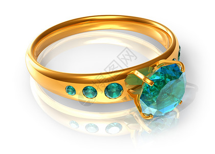 订婚金戒指带绿宝石的金戒指背景
