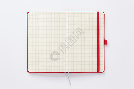 红色文案集打开在白背景顶视图上空页的笔记本或书面背景