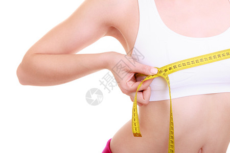 健康照顾和营养年轻身体健康的妇女适合孩配有测量胶带其胸围在白边图片