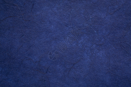 深蓝色纹理手工造毛莓纸背景图片
