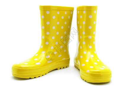 雨靴黄色巨人白色的孤立无援背景